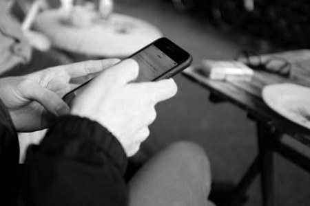 Using mobile phone in cafe